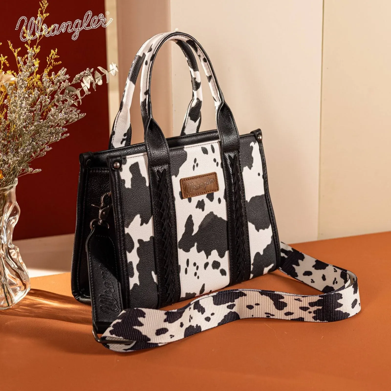 Wrangler Women's Cow Print Crossbody Bag with Concealed Carry