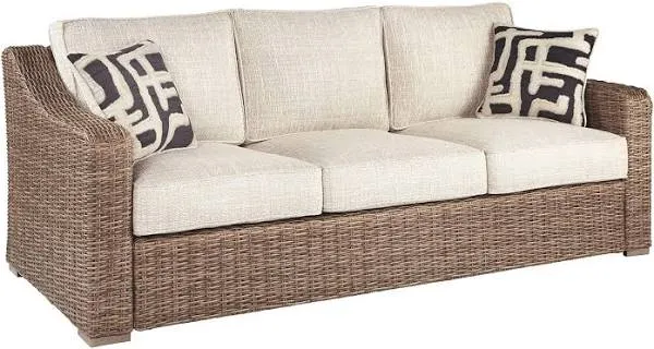 Signature Design by Ashley Beachcroft Handwoven Cushioned Wicker Sofa