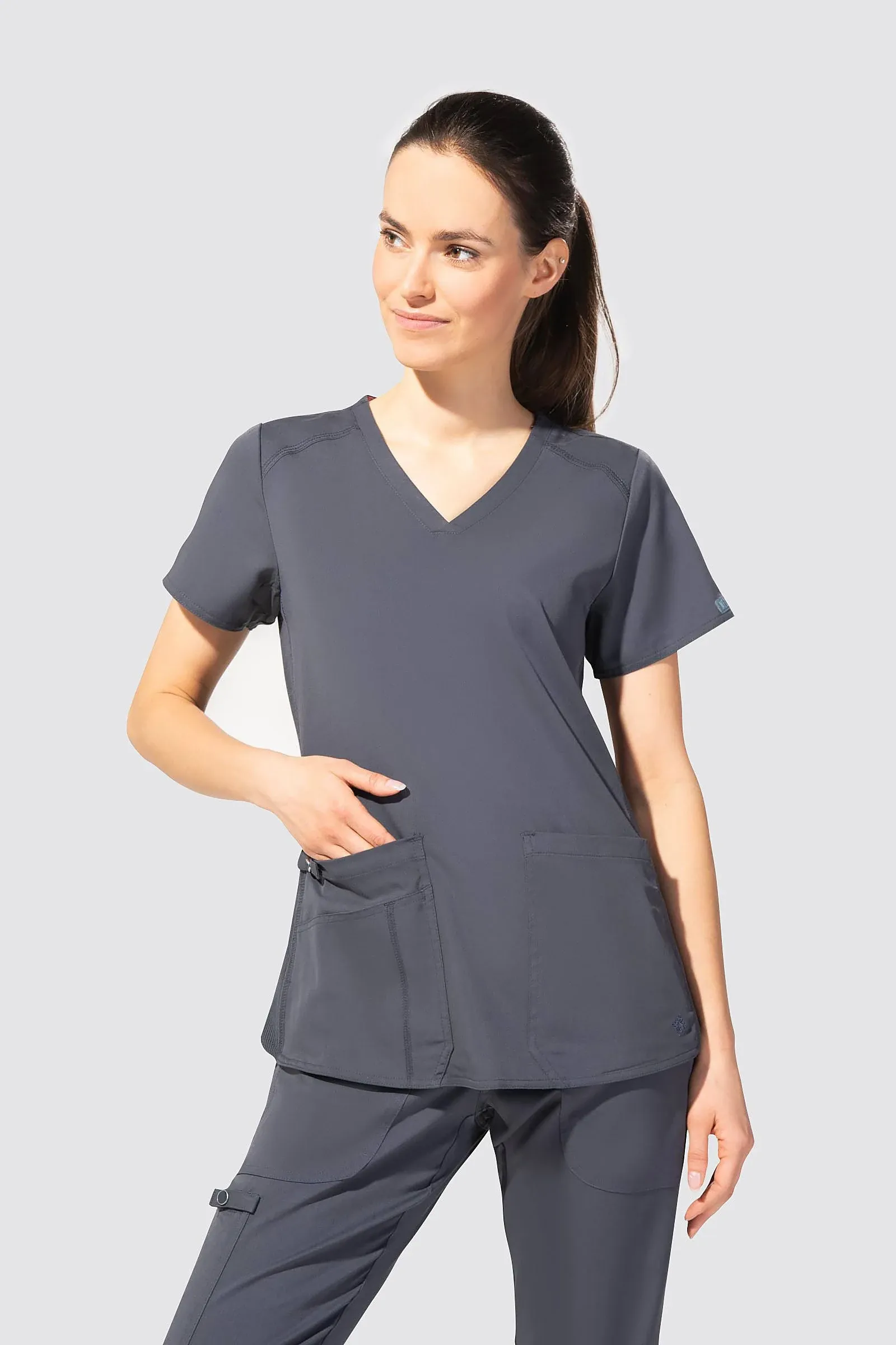 Med Couture V-Neck Scrub Top for Women with 4 Pockets, Rib-Knit Side Panel, and Shirttail Hem MC7459